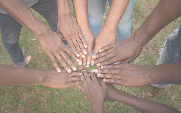 Hands coming together in unity